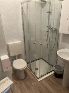 Koupelna v ubytování Albergo La Grolla