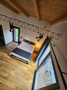 Postel nebo postele na pokoji v ubytování GiardinidiEva Loft