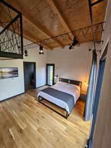 Postel nebo postele na pokoji v ubytování GiardinidiEva Loft