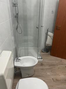 Koupelna v ubytování Albergo La Grolla