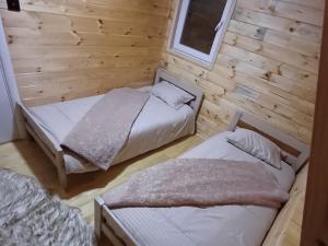 Krevet ili kreveti u jedinici u okviru objekta Mountain house Vojinovic Planinska kuća Vojinovic