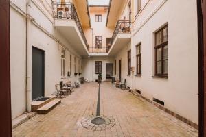 an empty alley in an old building at Old Town Central Apartment in Cluj-Napoca