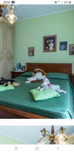 A bed or beds in a room at El Giardino delle Rose.....
