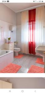 A bed or beds in a room at El Giardino delle Rose.....
