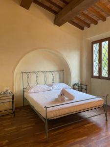 Postel nebo postele na pokoji v ubytování Casa vacanze Le due torri