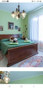 A bed or beds in a room at El Giardino delle Rose.....