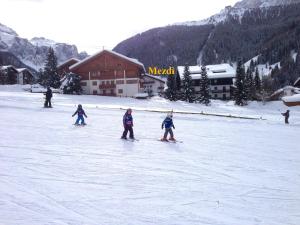Garni Hotel Mezdi v zimě