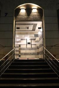 a set of stairs in a subway station at night at Nour Hotel in Amman