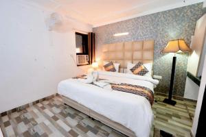 Postel nebo postele na pokoji v ubytování Hotel Clink New Delhi Airport