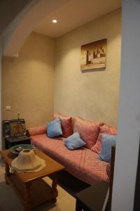 Area soggiorno di Riad La Rose Des Sables