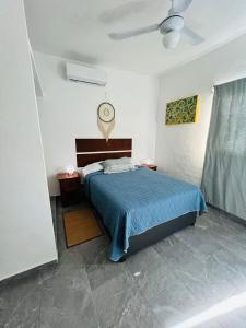 Ένα ή περισσότερα κρεβάτια σε δωμάτιο στο Centrico Departamento 401