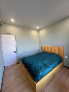 Postel nebo postele na pokoji v ubytování Event House Saguramo