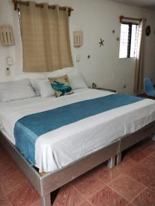 Postel nebo postele na pokoji v ubytování San Miguel 2 + 1 fotografie