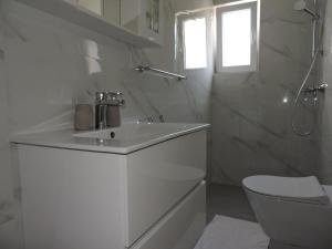 Kúpeľňa v ubytovaní Berat Apartment