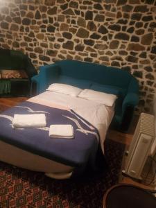 Posteľ alebo postele v izbe v ubytovaní DARMO'S COTTAGE