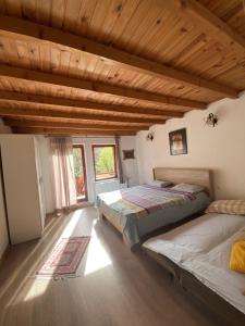 Postel nebo postele na pokoji v ubytování Great Escape Villa