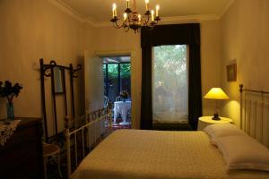 Tempat tidur dalam kamar di Villa Themistokli