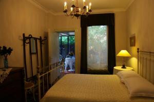 Postel nebo postele na pokoji v ubytování Villa Themistokli + 37 fotografií