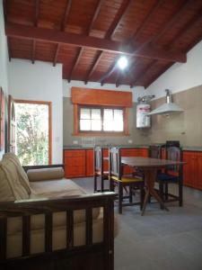 a living room with a couch and a table at CASA Don Manuel in Miramar