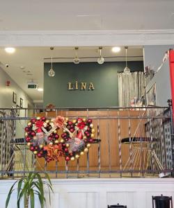 a stage with a wreath of fruit on it at Lina Hotel Taksim Pera in Istanbul