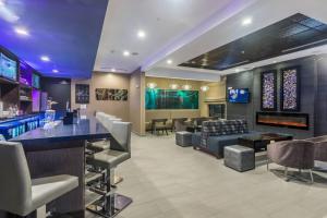 a bar with couches and a pool table at SpringHill Suites by Marriott Oklahoma City Downtown in Oklahoma City