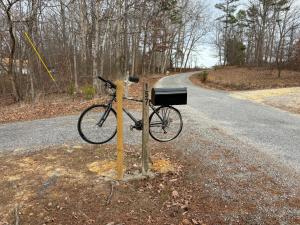 a bike parked on the side of a road at Nate’s Cabin in Fort Payne