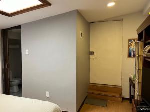 Katil atau katil-katil dalam bilik di Cozy Room
