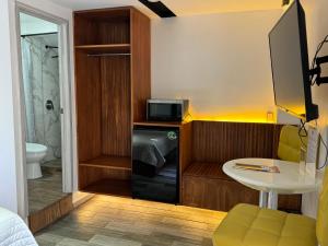 TV a/nebo společenská místnost v ubytování Hotel DABA