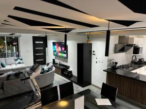 Kuchyň nebo kuchyňský kout v ubytování Hotel DABA