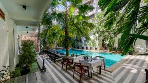 Πισίνα στο ή κοντά στο Boutique Indochine d'Angkor