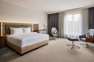 Posteľ alebo postele v izbe v ubytovaní Courtyard by Marriott Schwerin