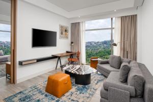 A television and/or entertainment centre at Four Points by Sheraton Kampala