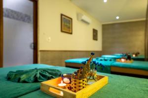 Voodi või voodid majutusasutuse Amina Lantana Hoi An Hotel & Spa toas