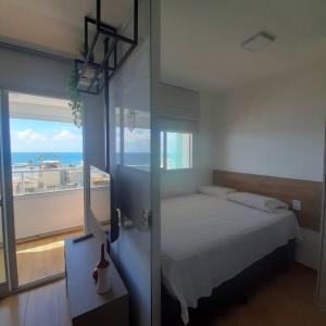 Postel nebo postele na pokoji v ubytování Apartamento Smart Pituba