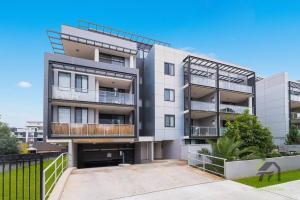 an image of an apartment building with balconies at Wonderful Home in Your Heart in Waitara