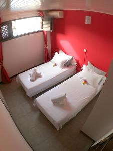 Letto o letti in una camera di Tante Arlette