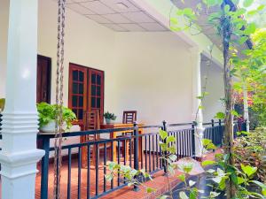 A balcony or terrace at Priyavimana resort