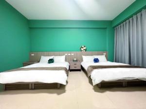 Letto o letti in una camera di NuNc