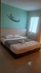Katil atau katil-katil dalam bilik di Laguna Apartment 2, Marina Island Homestay