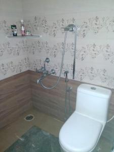 Koupelna v ubytování BYMANA ESTATE STAY...! + 30 fotografií