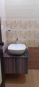 Koupelna v ubytování BYMANA ESTATE STAY...!