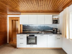 Η κουζίνα ή μικρή κουζίνα στο Ferienhaus Alpenflora