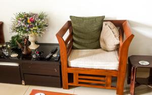 a chair sitting in front of a desk at Mount View Residencies in Colombo