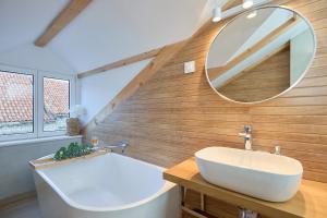 a bathroom with a white sink and a mirror at Hedera Estate, Villa Hedera XVII in Dubrovnik +55 photos