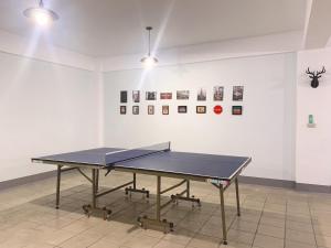 Stolní tenis v ubytování Guan Lun Hotel nebo okolí