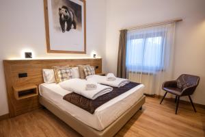 Postel nebo postele na pokoji v ubytování Hotel Iris