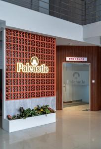 a store front of a palazzo sign in a building at Palcastle Regency in Palakkad