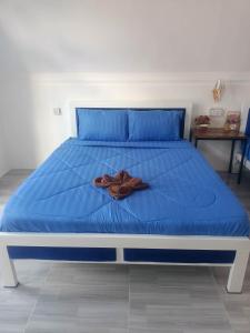 Postel nebo postele na pokoji v ubytování Blue Zone Hostel