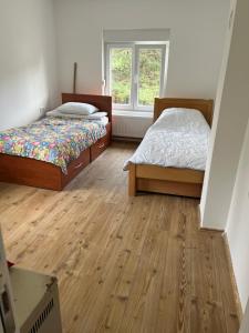 Giường trong phòng chung tại Vila Vera