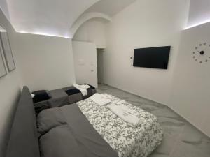 Ένα ή περισσότερα κρεβάτια σε δωμάτιο στο Carlant Apartment
